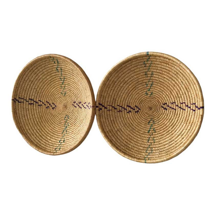 A set of two handwoven vintage-style baskets, one with a lid, showcasing intricate weaving patterns and rustic charm, ideal for storage and home decor