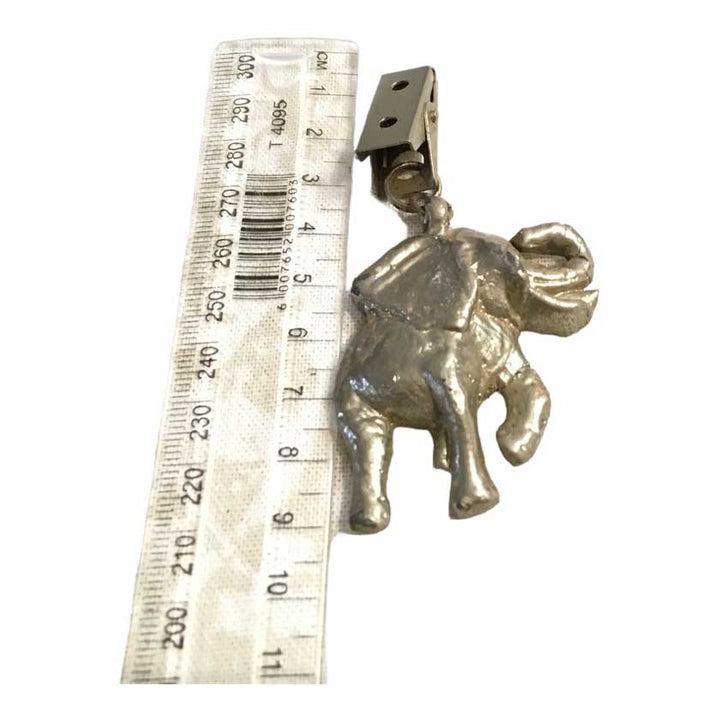 Antique elephant tablecloth holder clips