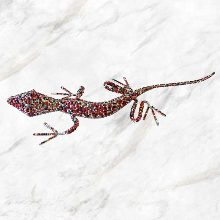 Vibrantly colored Handmade African Bead & Wire Lizard sculpture, showcasing intricate beadwork and wire craftsmanship, a celebration of African artistry and wildlife