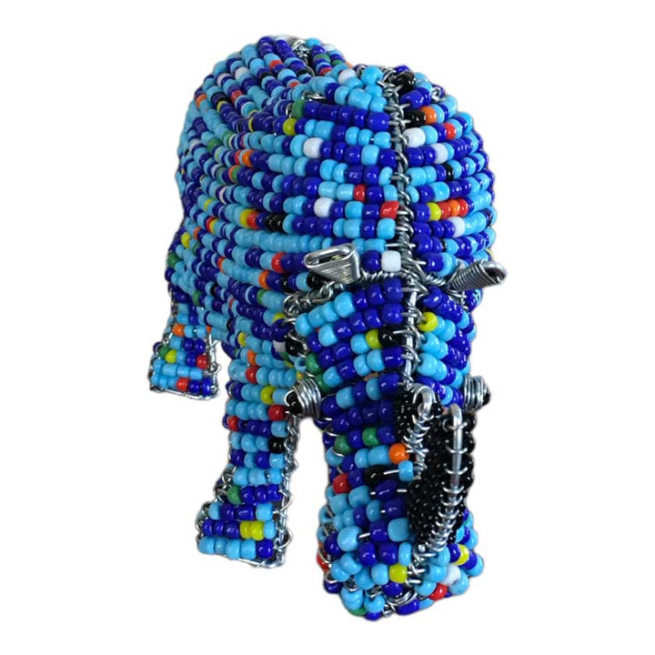 Vibrant handmade African bead and wire rhino sculpture, showcasing intricate craftsmanship and cultural significance, ideal for African art enthusiasts and home decor