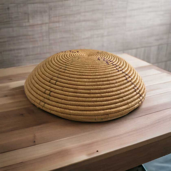 A set of two handwoven vintage-style baskets, one with a lid, showcasing intricate weaving patterns and rustic charm, ideal for storage and home decor