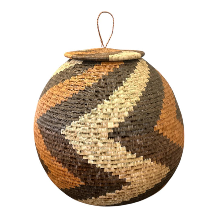 Woven basket with a lid on a white background